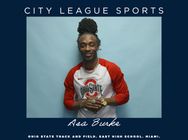 man wearing ohio state shirt against a sky blue backdrop